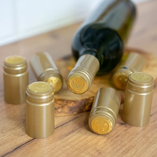 Perforatsiooniga kuldsed kapslid fi 31mm 100 tk - 2