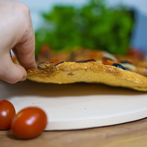 Ümmargune pitsakivi, valmistatud kordieriidist, läbimõõt 33 cm - 13