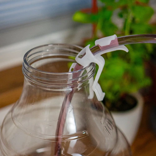 Veini ümbervillimise komplekt hoidiku ja klambriga - 11